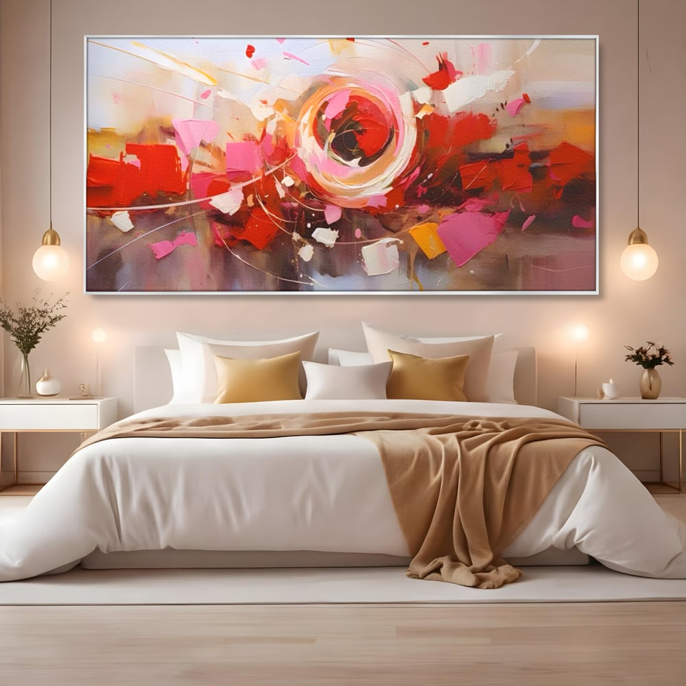 Tablou canvas cu tablou canvas cu floare abstracta si culori vibrante, in rama de aluminiu argintiu, pe perete intr-un dormitor